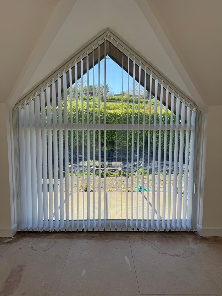 White vertical blinds installed in Belfast home