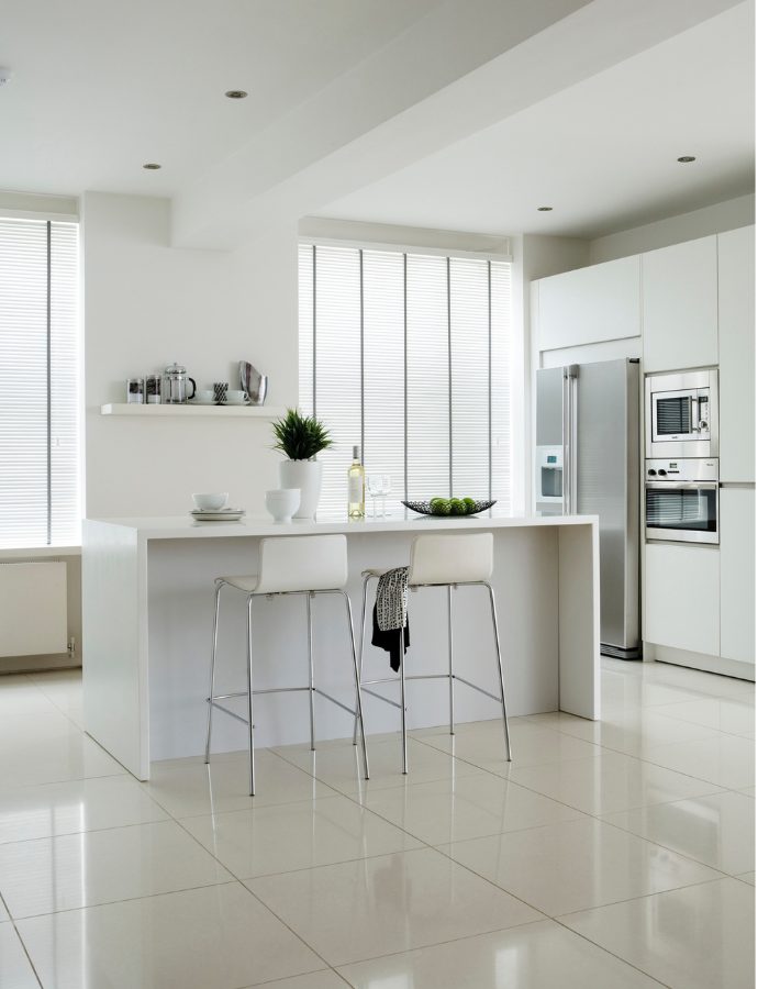 A Bangor West kitchen fitted with modern roller blinds